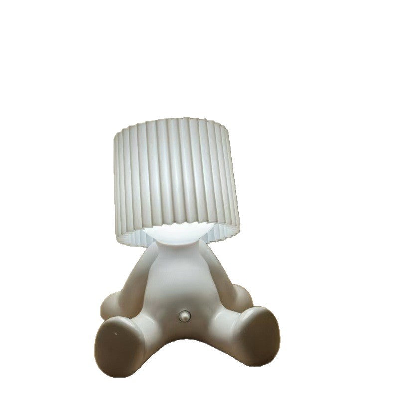 Shy Boy Desk Lamp – warm retro ambience, soft glow, and integrated charging. Ideal for bedrooms, desks, and decorative corners.